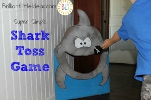 DIY shark toss game. Is a Great game for Ocean theme party, Shark theme, VBS, or a rainy day activity. Quick to make & easy game that all kids love.