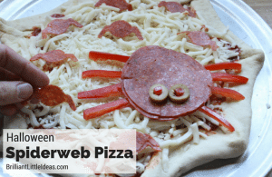 I swear this is the cutest Homemade Halloween Spiderweb Pizza. I can't wait to make this kid recipe with my son later he loves homemade pizza Halloween food