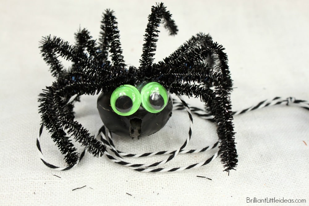 Let your kids make this Simple Spider Necklace for their fall craft. All you need is cheese cloth, eyes, string, and a bell to make this Halloween necklace.