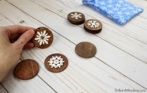 How to make your own DIY Snowflake Matching Game complete with Video. Great Christmas gift or stocking stuffer for kids. Great classroom gifts #christmas