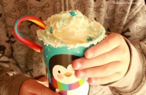 The Ultimate White Hot Chocolate is sure to put a smile on any kids face. Especially what is on the rim. They will be begging for more hot cocoa. This recipe is easy and even has a how to video. Peppermints are an added bonus as well as sprinkle toppings.